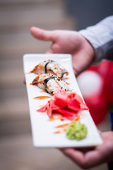 sushi dish food at a restaurant rice with seafood
