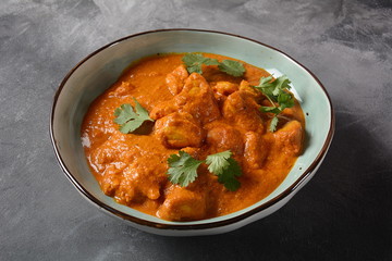 Chiken Tikka Masala - traditional Indian/British dish. Chicken with curry, turmeric. Indian dinner concept. Asian, Indian food