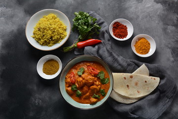 Chiken Tikka Masala - traditional Indian/British dish. Chicken with curry, turmeric. Indian dinner concept. Asian, Indian food