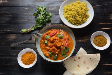 Chiken Tikka Masala - traditional Indian/British dish. Chicken with curry, turmeric. Indian dinner concept. Asian, Indian food