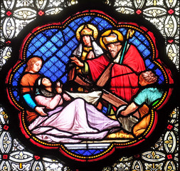 Obraz premium Recognition of the true Cross among the three discovered, stained glass window in the Basilica of Saint Clotilde in Paris, France 