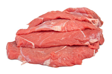 pile of raw red meat on white background