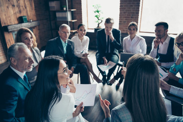 Nice classy stylish trendy cheerful sharks experts ceo boss chief sitting on chairs in circle...
