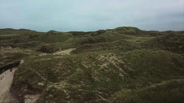 Sandhills and a man