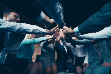 Low below angle view of nice stylish elegant cheerful sharks marketers company culture directors executive managers putting clapping palms at industrial loft interior work place space