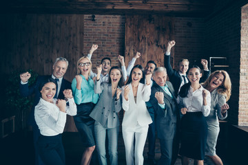 Close up photo yelling diversity different age multiethnic mixed race business people stand she her he him his best brigade hands arms raised up project got first place formalwear jackets shirts - Powered by Adobe