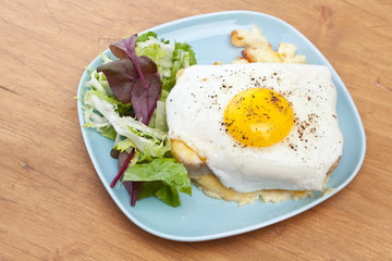 Serving of Croque Madame (Ham, Cheese and Fried Egg Sandwich)