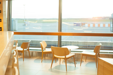 Waiting for the flight. Airport through the gate window