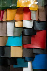 Tanned leather on shelf in craftsmanship market