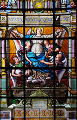 Assumption of the Virgin Mary, stained glass windows in the Saint Laurent Church, Paris, France