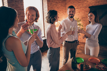 Company of nice sweet attractive lovely pretty cheerful positive guys ladies pal having fun day enjoying best every year birthday house tradition custom snack in industrial loft interior room
