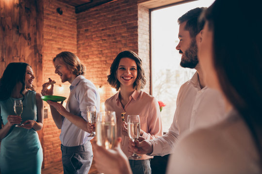 Company of several nice attractive lovely pretty cheerful positive caucasian guys ladies pal having fun enjoying delicacy best new every year birthday house tradition custom in industrial loft