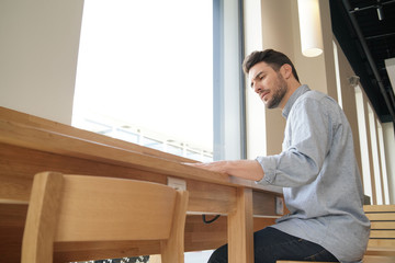 Handsome salesman preparing presentation on work trip