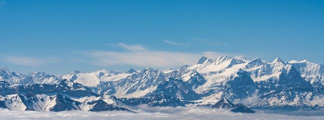 Switzerland, panoramic view from Pilatus on Alps in clouds
