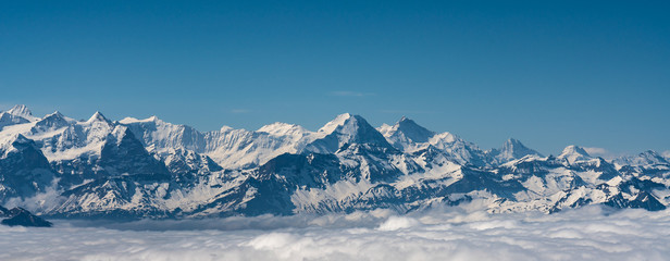 Fototapeta na wymiar Switzerland, panoramic view from Pilatus on Alps in clouds