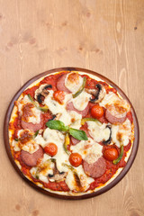 salami, mushroom and vegetable pizza
