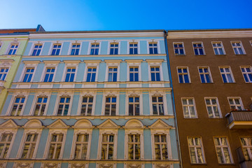 Fototapeta na wymiar yellow, blue and brown houses in a row