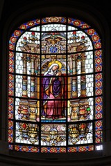 Virgin Mary, stained glass windows in the Saint Roch Church, Paris, France 