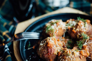 Stewed meatballs with vegetables on the table
