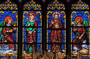 Virgin Mary and Jesus with angels, stained glass window from Saint Germain-l'Auxerrois church in Paris, France