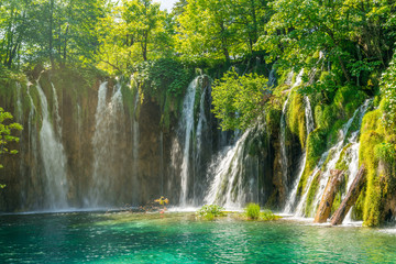 wonderful waterfalls and lake in the forest of plitvice national park