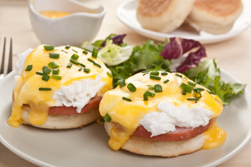 Eggs Benedict- toasted English muffins, ham, poached eggs hollandaise sauce
