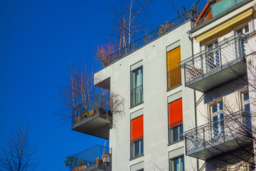 Obraz premium some colorful apartments from the exterior view with darken sky