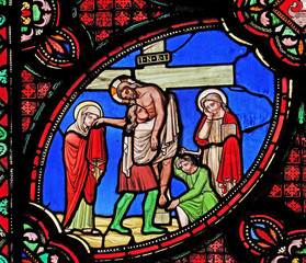Fototapeta na wymiar Deposition from the Cross, stained glass window from Saint Germain-l'Auxerrois church in Paris, France 