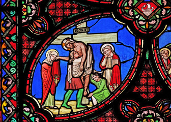 Fototapeta na wymiar Deposition from the Cross, stained glass window from Saint Germain-l'Auxerrois church in Paris, France 