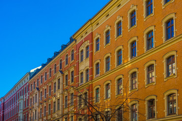 Fototapeta na wymiar brick apartment houses at berlin in a vanishing point view