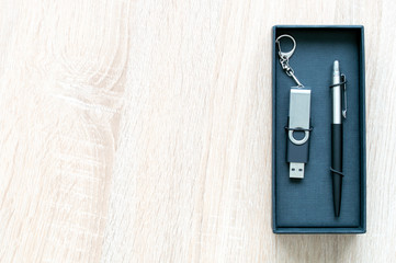 pen and USB flash drive in a gift box