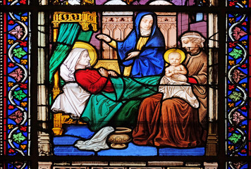 Obraz na płótnie Canvas Birth of the Virgin Mary stained glass windows in the Saint Eugene - Saint Cecilia Church, Paris, France