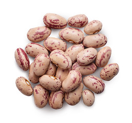 A pile of pinto beans isolated on white background.