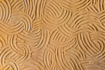 pattern of yellow sand on ground. Natural background