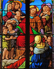 Jesus blesses the children, stained glass windows in the Saint Eugene - Saint Cecilia Church, Paris, France