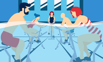 People doing aquacycling exercises in a pool.