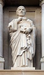 Obraz premium Statue of Saint Augustine on the facade of Saint Augustine church in Paris, France 