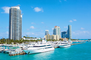 Fototapeta na wymiar Miami, Florida, USA downtown skyline. Building, ocean beach and blue sky. Beautiful city of United States of America