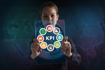 The concept of business, technology, the Internet and the network. A young entrepreneur working on a virtual screen of the future and sees the inscription: KPI