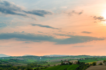 Fototapeta na wymiar beautiful sky at sunset over a countryside landscape