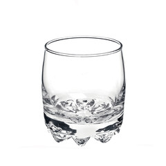 Empty glass for strong alchole isolated on white background. Side view.