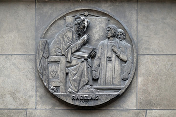 Francois Rabelais, French Renaissance writer, physician, Renaissance humanist, monk and Greek scholar. Stone relief at the building of the Faculte de Medecine Paris, France