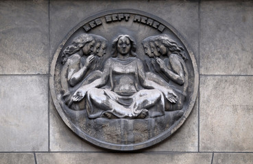The seven mothers. Stone relief at the building of the Faculte de Medicine Paris, France 