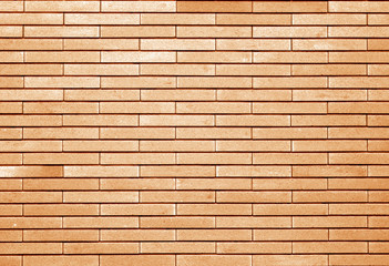 Decorative brick wall in orange tone.