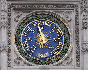 Fototapeta na wymiar Clock on the Saint Germain l'Auxerrois church in Paris, France 