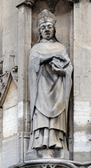 Fototapeta na wymiar Saint Cera statue on the portal of the Saint Germain l'Auxerrois church in Paris, France