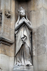 Saint Radegund statue on the portal of the Saint Germain l'Auxerrois church in Paris, France 