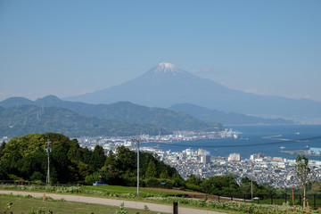 Fototapeta premium Japan city view over looking Mt. Fuji and the sea.
