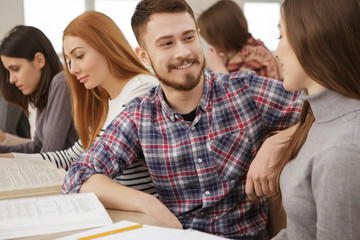 University students working on a project together
