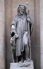 Obraz premium Saint Roch, statue on the portal of Saint Roch church in Paris, France